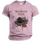 Pink t-shirt with "Maximilian's Bach Reading Between the Lines" and book graphic.