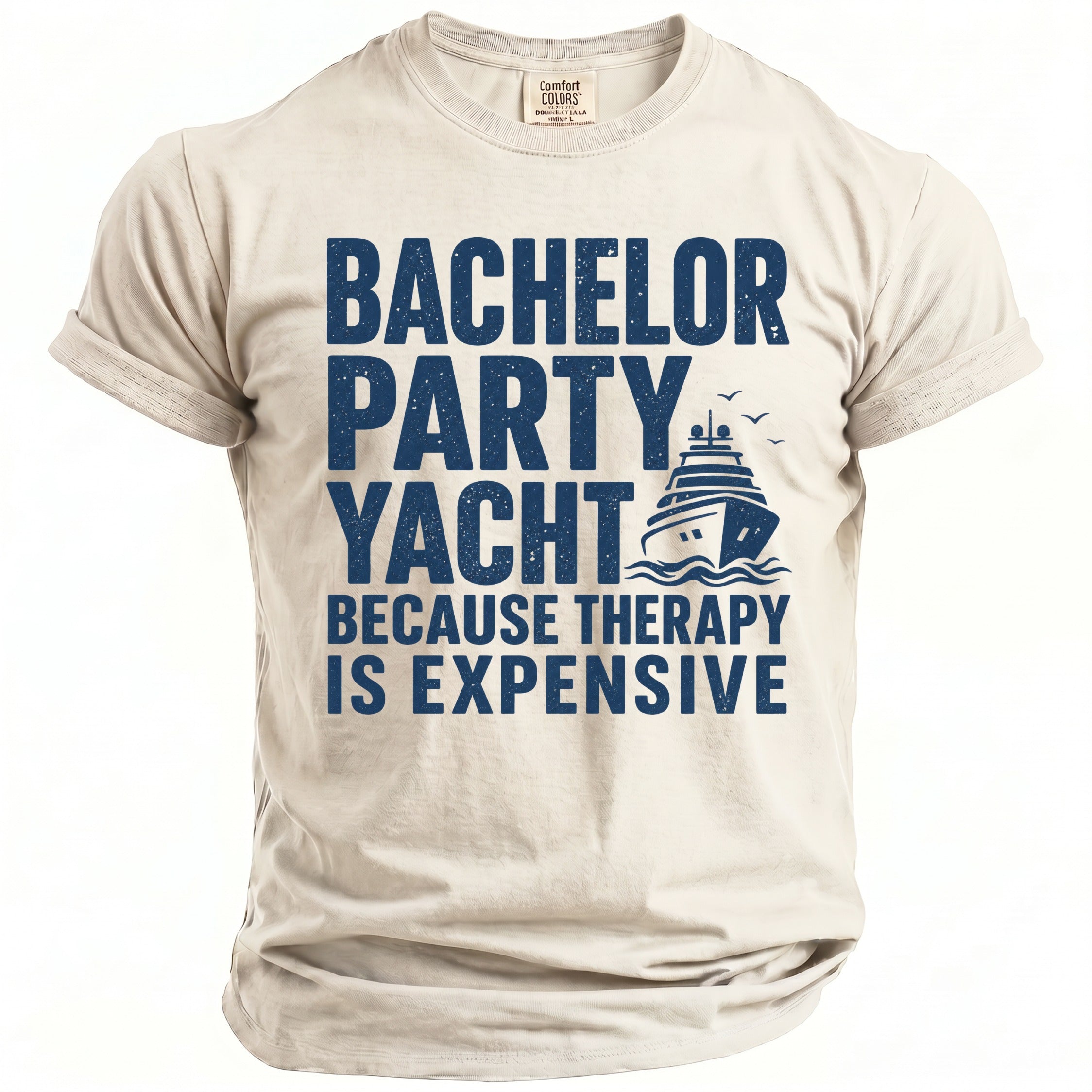 Light tan t-shirt with "Bachelor Party Yacht Because Therapy Is Expensive" text and yacht graphic.