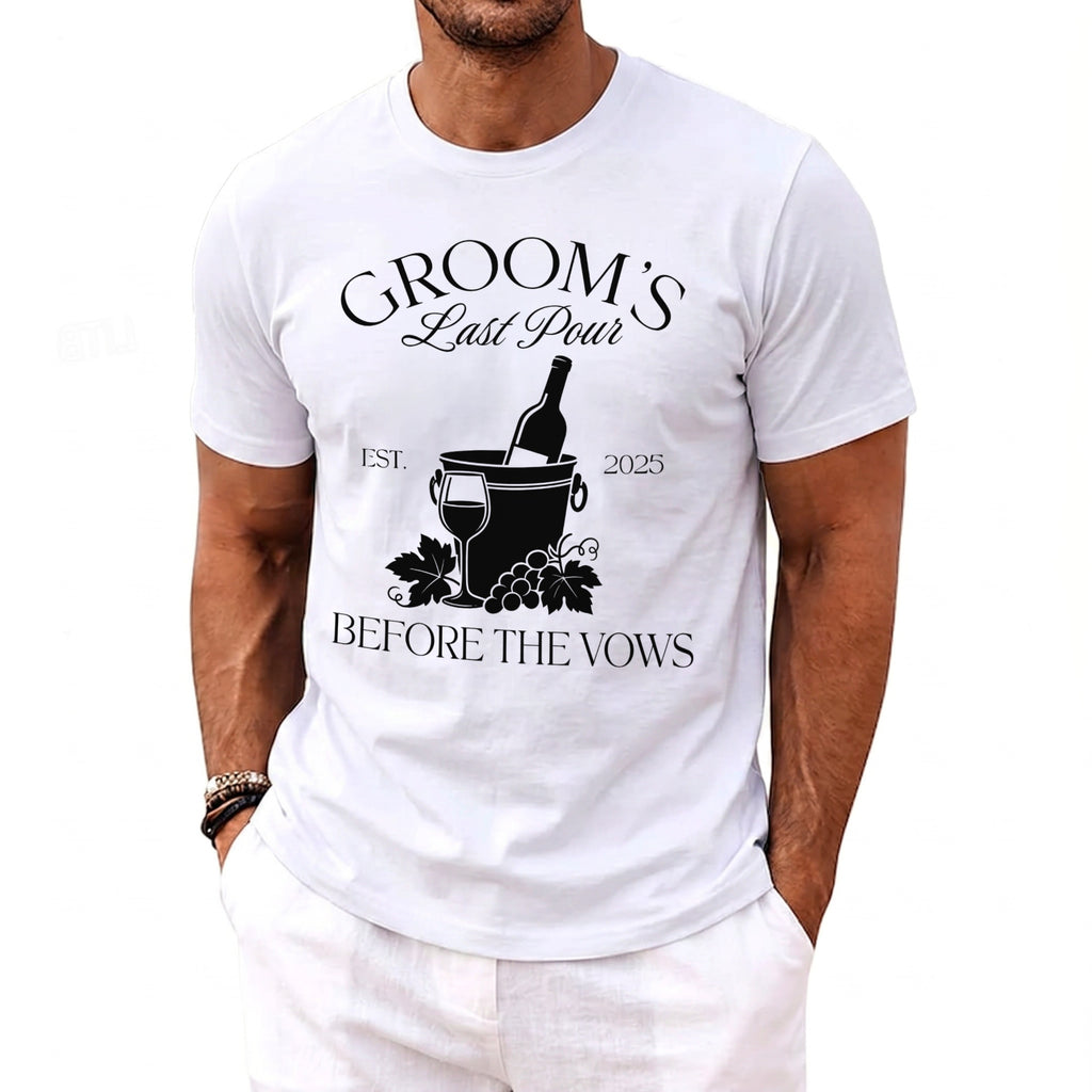 White t-shirt with "Groom's Last Pour EST. 2025 BEFORE THE VOWS" text and wine imagery.