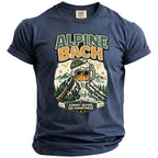 Navy t-shirt with "Alpine Bach" text and beer mug on mountain graphic.