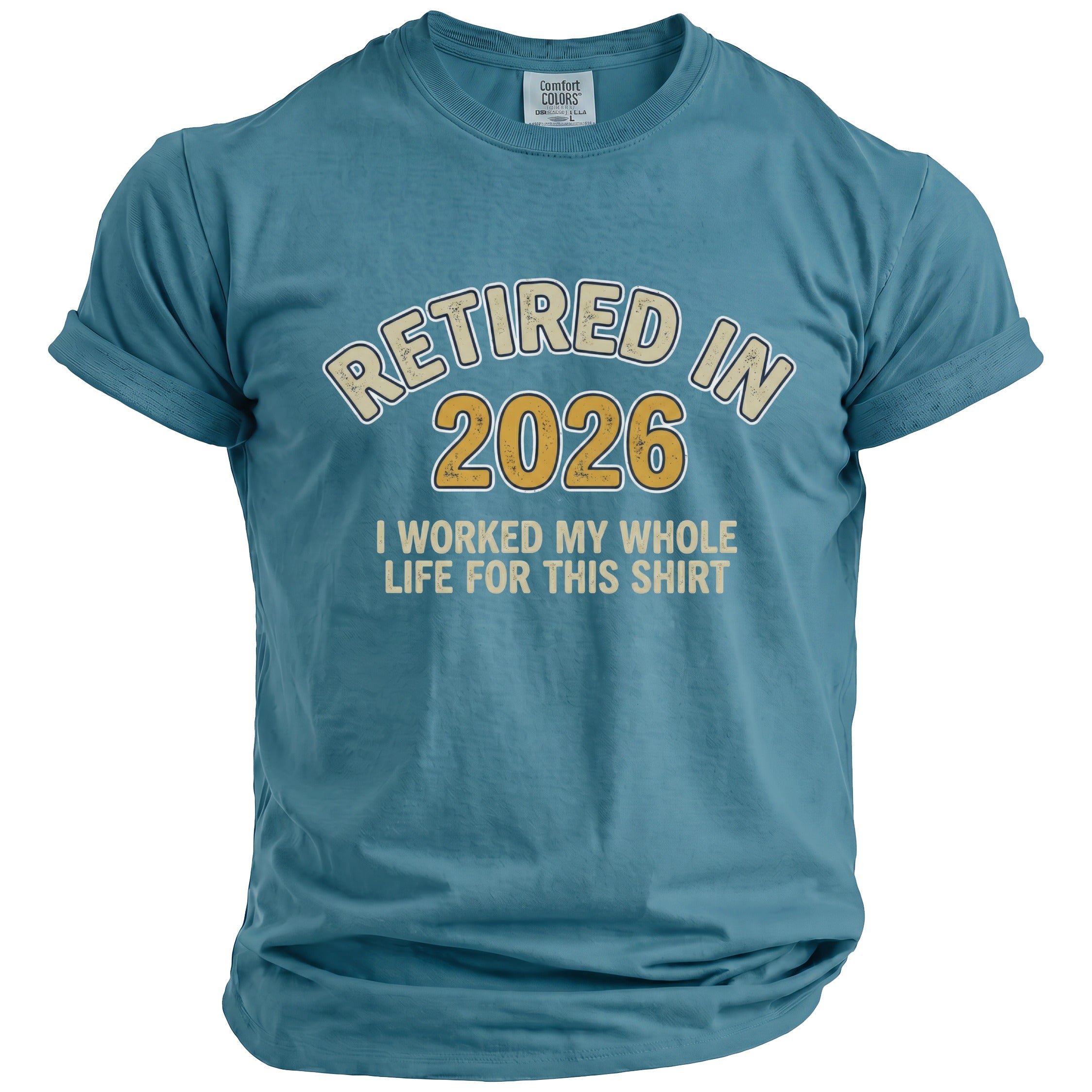 Teal t-shirt with text "Retired in 2026 I worked my whole life for this shirt."
