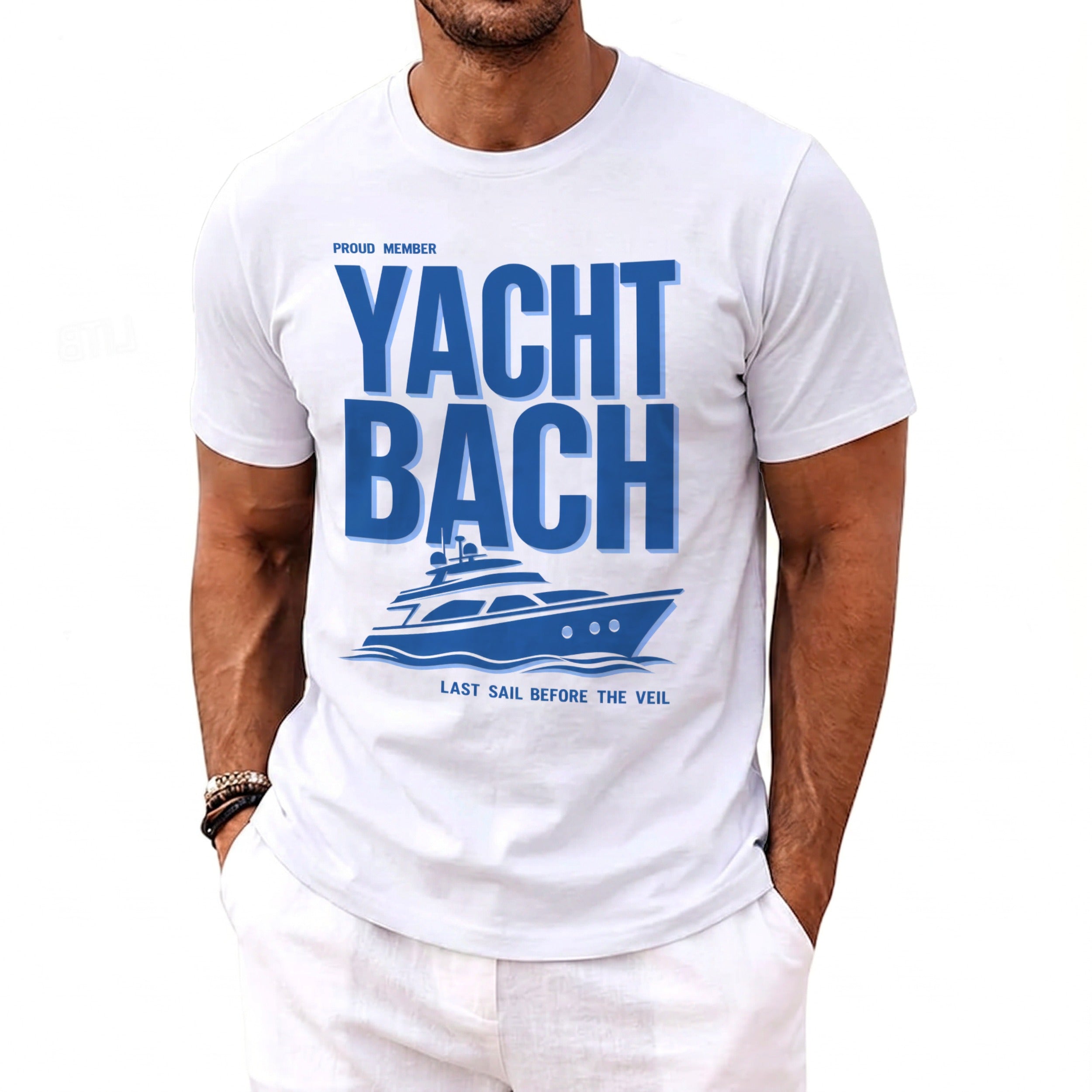 White t-shirt with blue text "PROUD MEMBER YACHT BACH" and a yacht graphic.