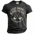 Dark grey t-shirt with "Last Swing Before the Ring" and crossed golf clubs.