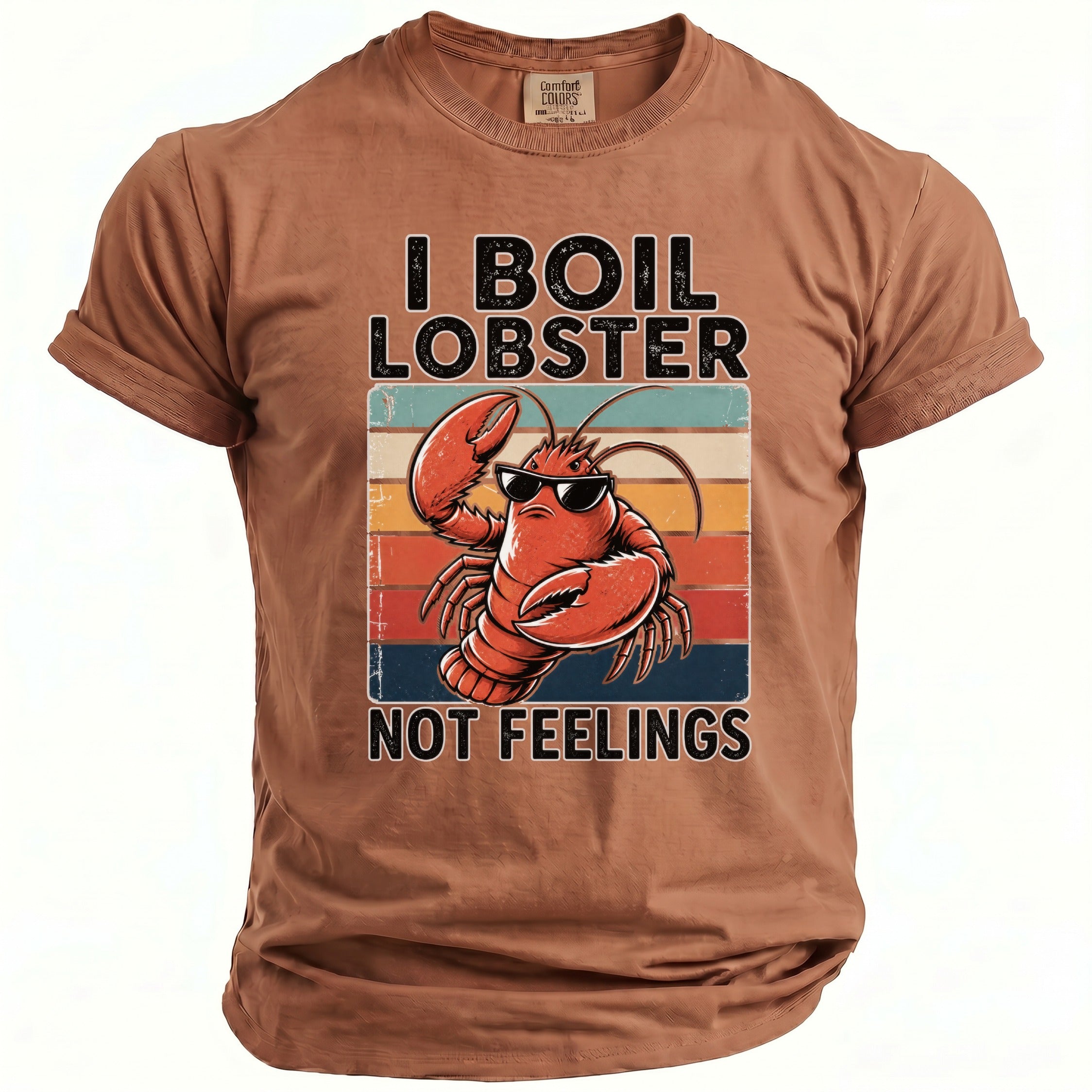 Brown t-shirt with text "I BOIL LOBSTER NOT FEELINGS" and a cartoon lobster.