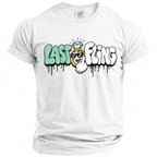 White t-shirt with "LAST FLING" graffiti-style text, diamond ring, and cartoon hand.