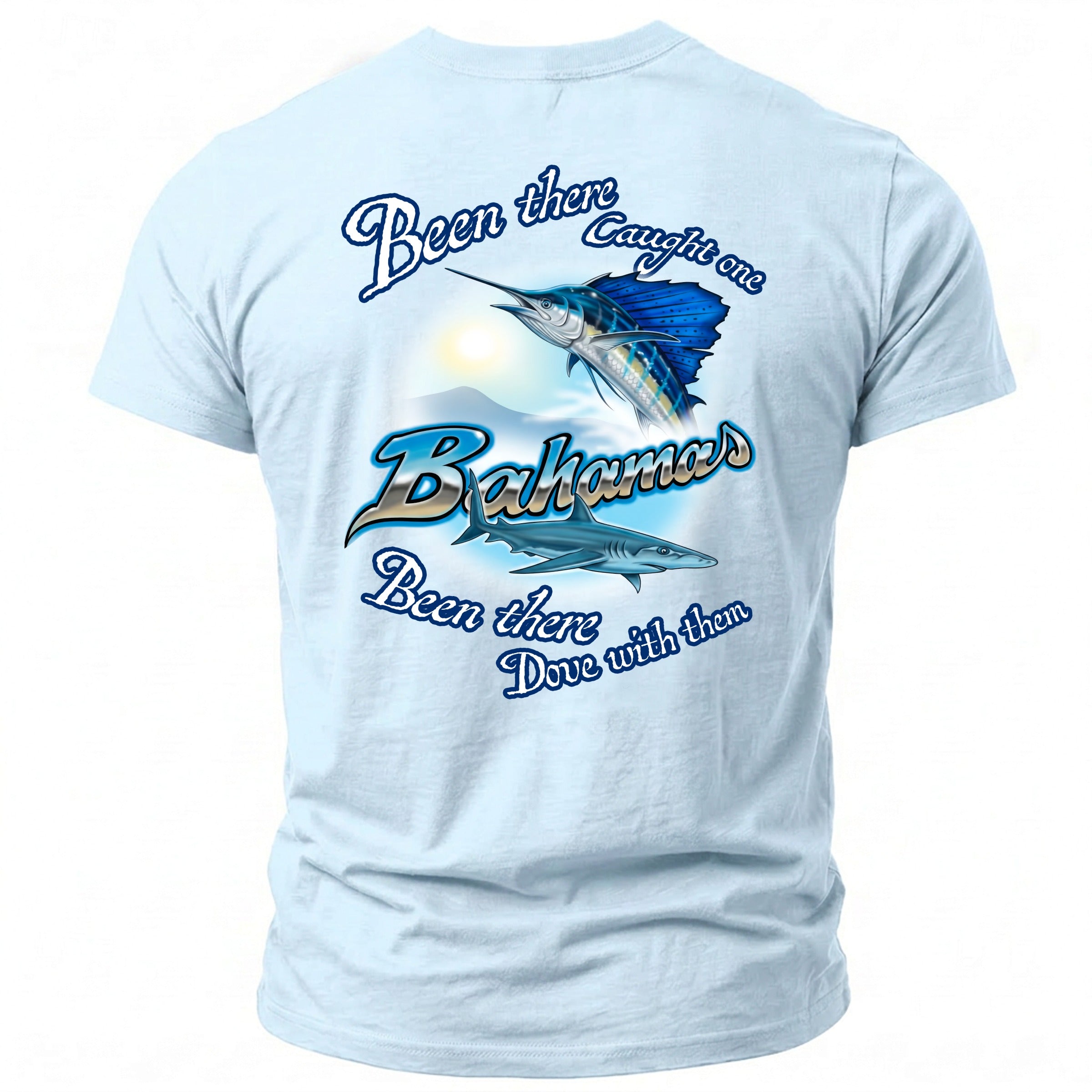 Light blue t-shirt with sailing and shark graphics and text.
