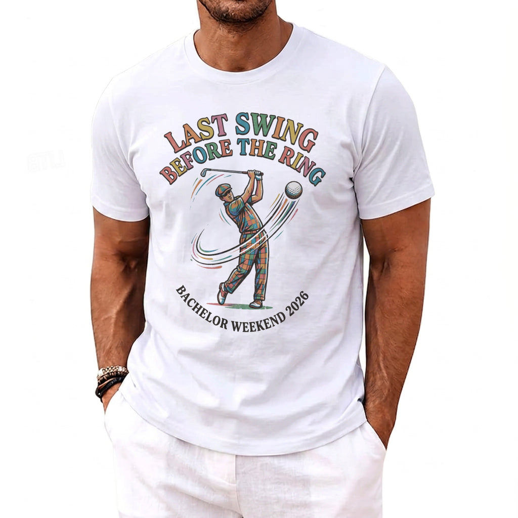 White t-shirt with "LAST SWING BEFORE THE RING BACHELOR WEEKEND 2026" graphic.