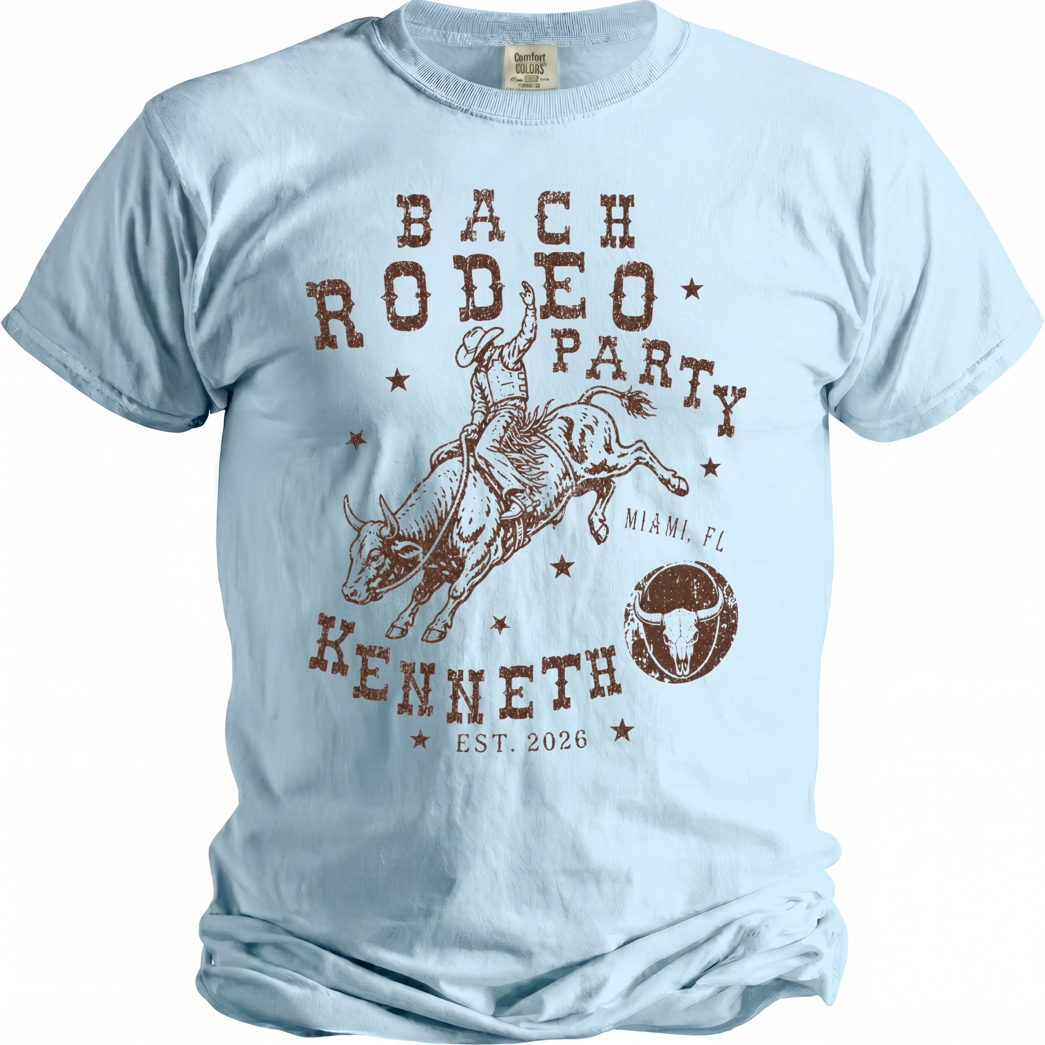 Light blue t-shirt with "Bach Rodeo Party Kenneth Est. 2026 Miami, FL" text.