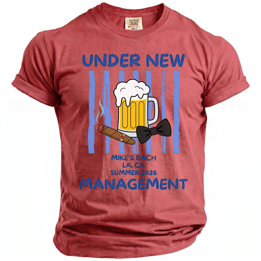 Red t-shirt with graphic. Text reads "Under New Management" and "Mike's Bach LA, CA Summer 2026."