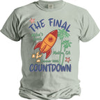 Light grey t-shirt with "The Final Countdown" graphic featuring a rocket, palm trees, and starfish.