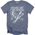 Blue t-shirt with white text and art supplies illustration.
