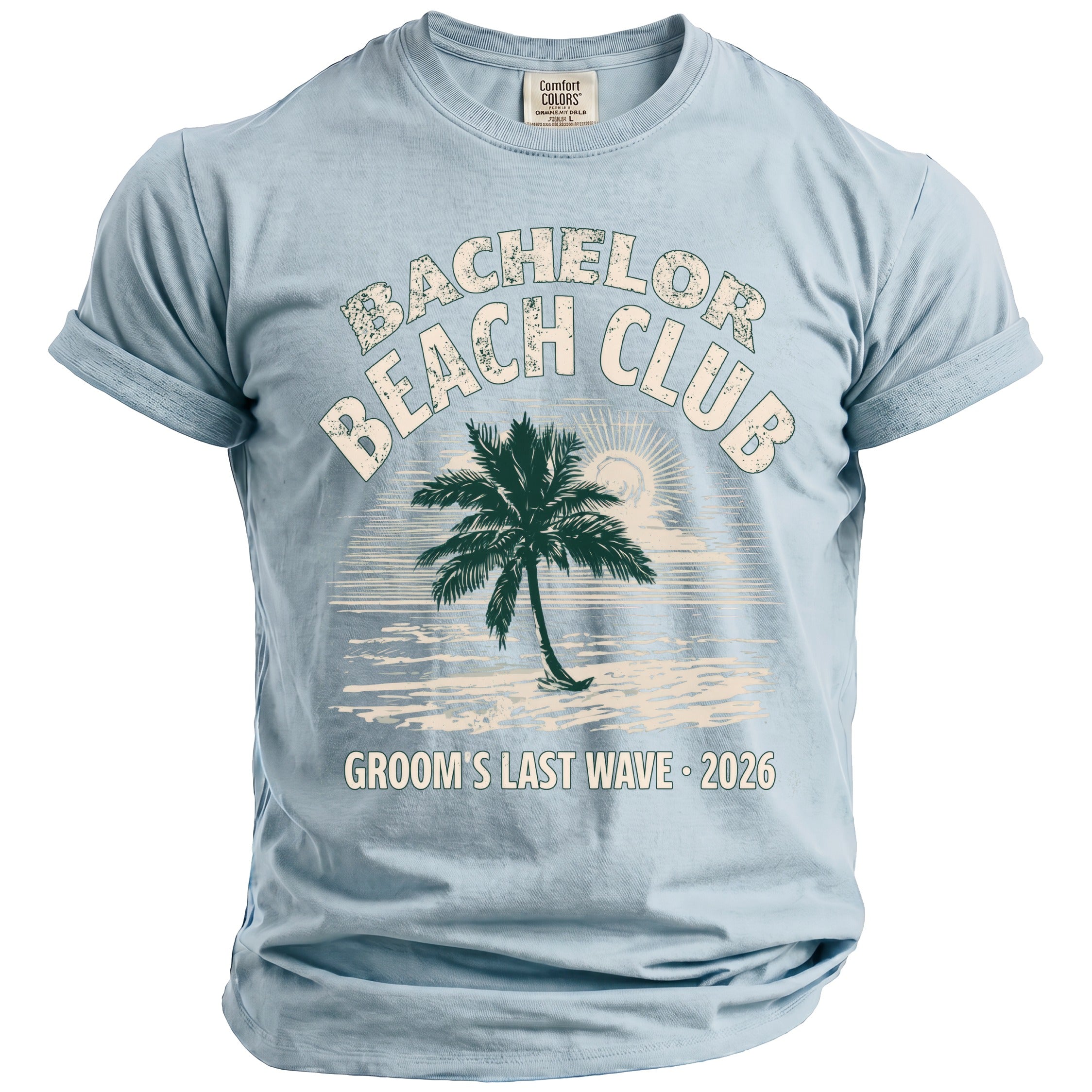 Light blue Comfort Colors t-shirt with "Bachelor Beach Club Groom's Last Wave 2026" text.