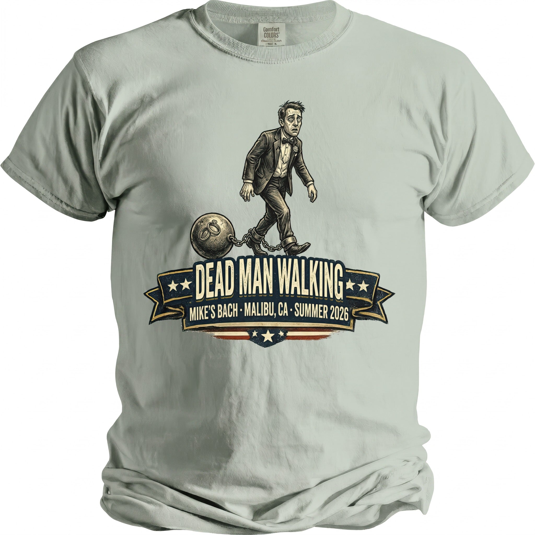 T-shirt graphic of a man in a suit chained to a ball labeled "Dead Man Walking"