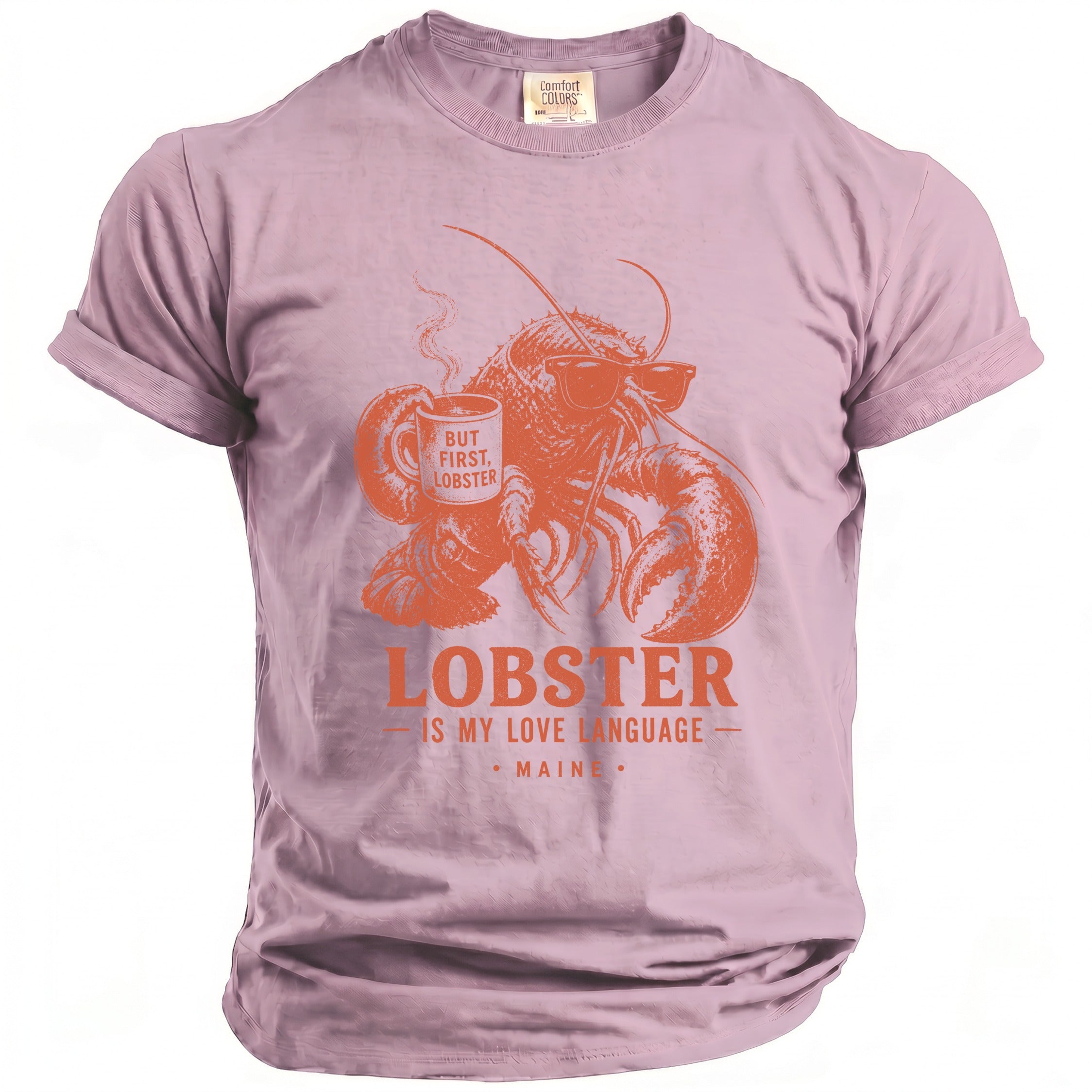 Pink t-shirt with orange graphic of a lobster drinking coffee and text "Lobster Is My Love Language Maine".