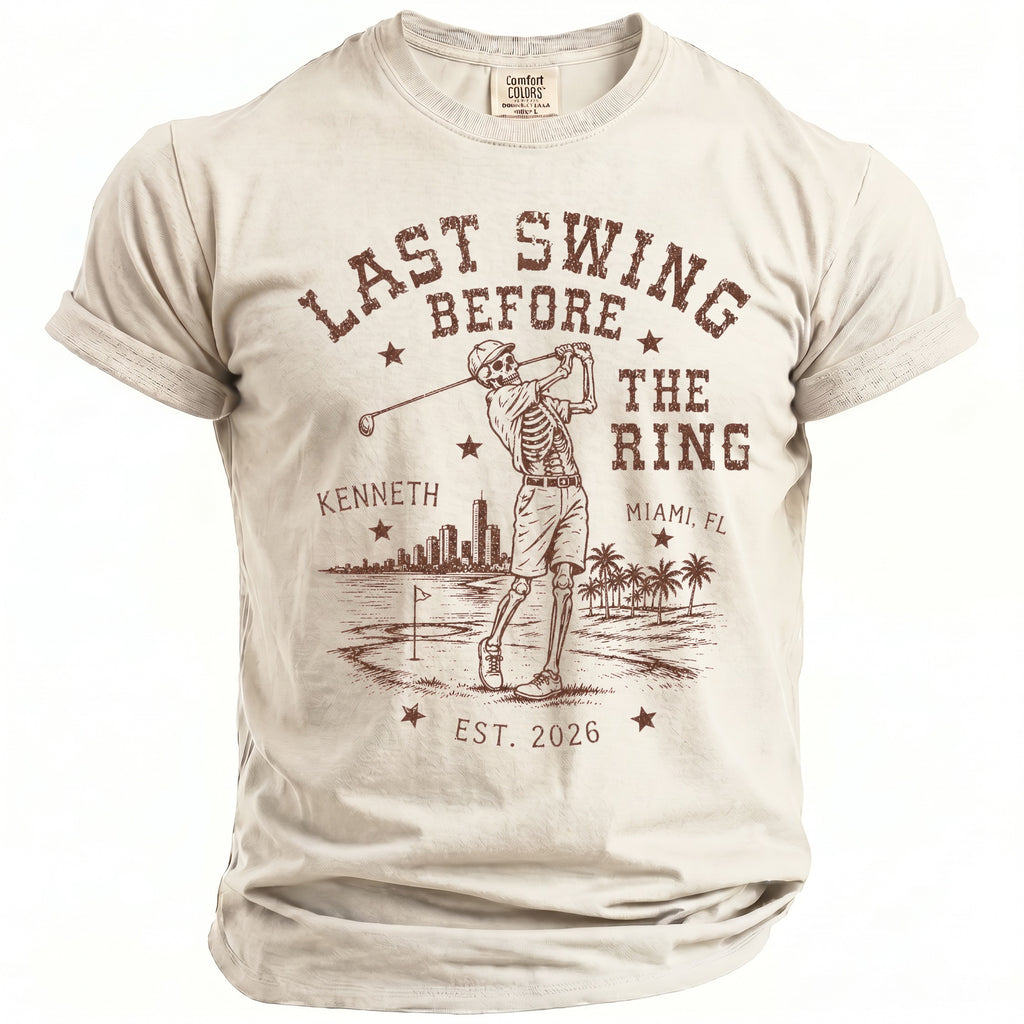 Skeleton golfer graphic on a beige t-shirt with "Last Swing Before The Ring" text.