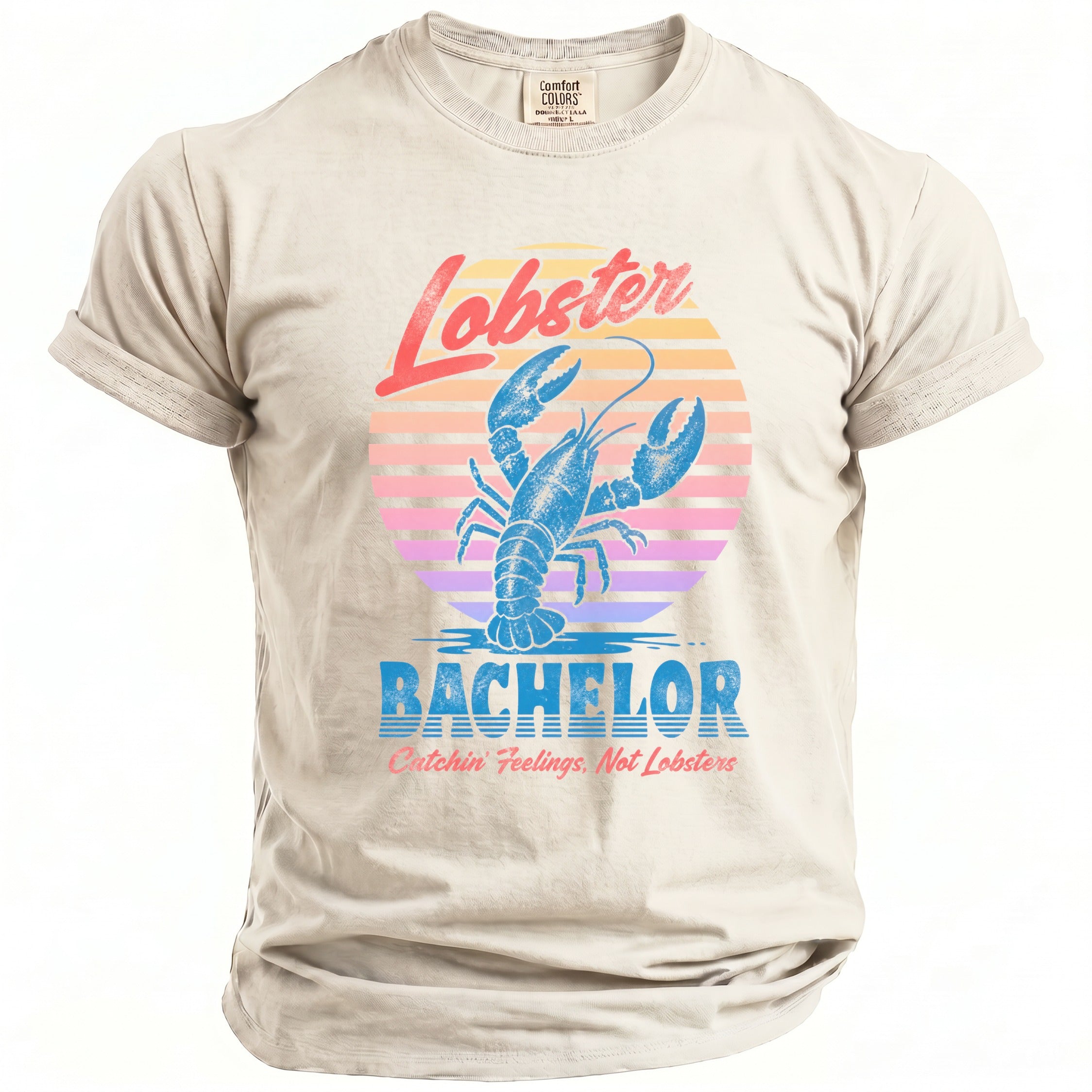 Light beige Comfort Colors shirt with a lobster and "Lobster Bachelor" graphic.