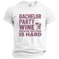 White t-shirt with "Bachelor Party Wine Because Adulting Is Hard" text.