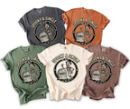 T-shirts in five colors with a skeleton, tombstone, and "Spooky & Single" text.