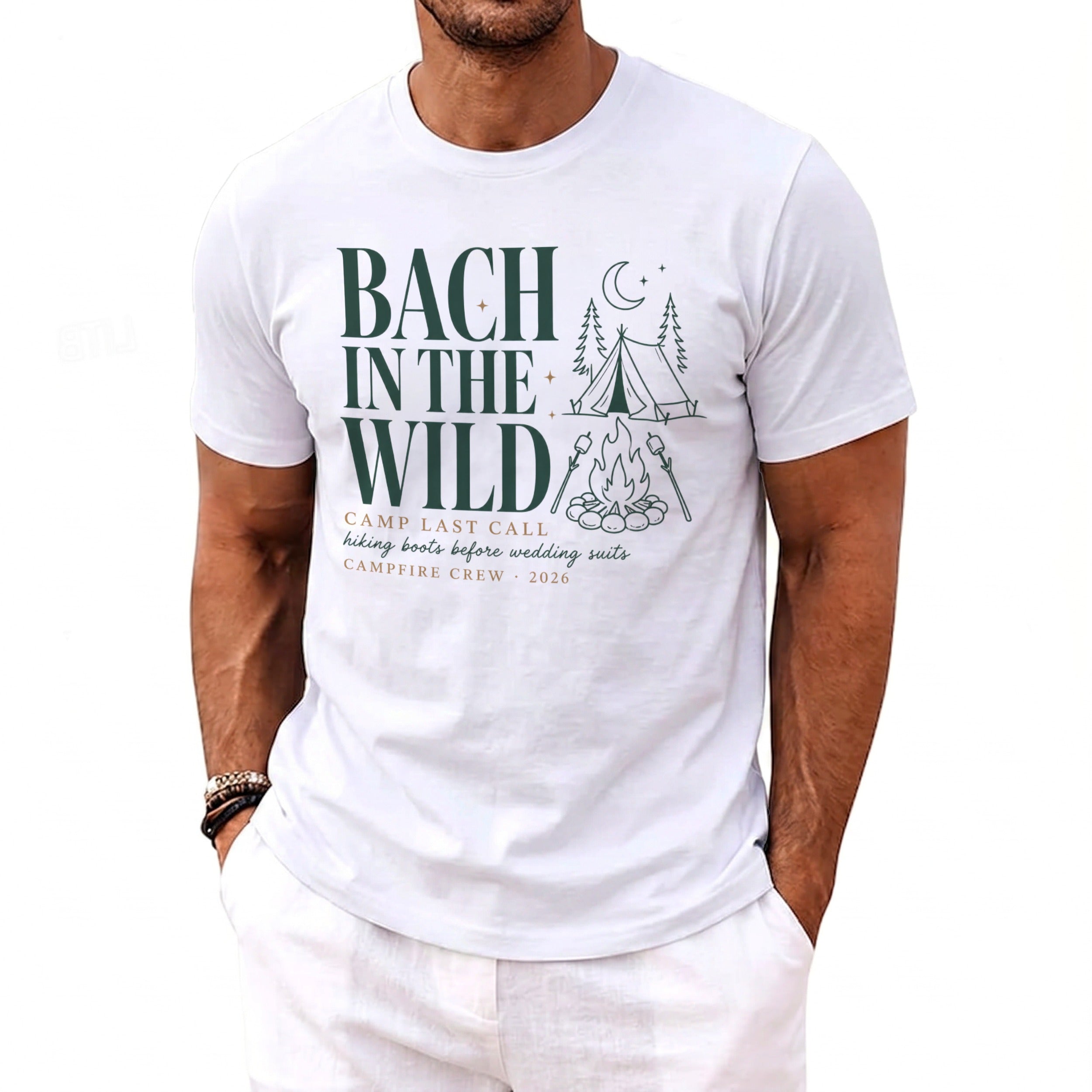 White t-shirt with "Bach in the Wild" text, tent, campfire, and 2026.