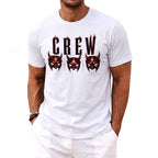 White t-shirt with "CREW" text and three red devil masks on the chest.