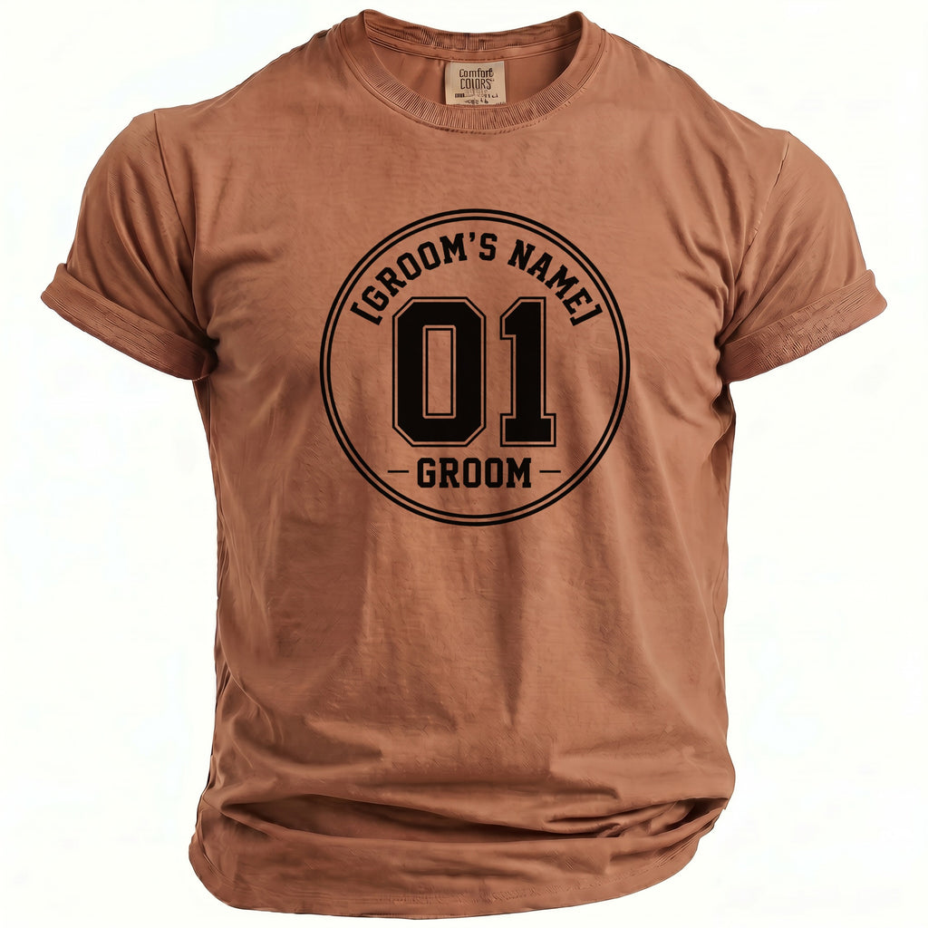 Brown t-shirt with "01 Groom" graphic in a circular black design.