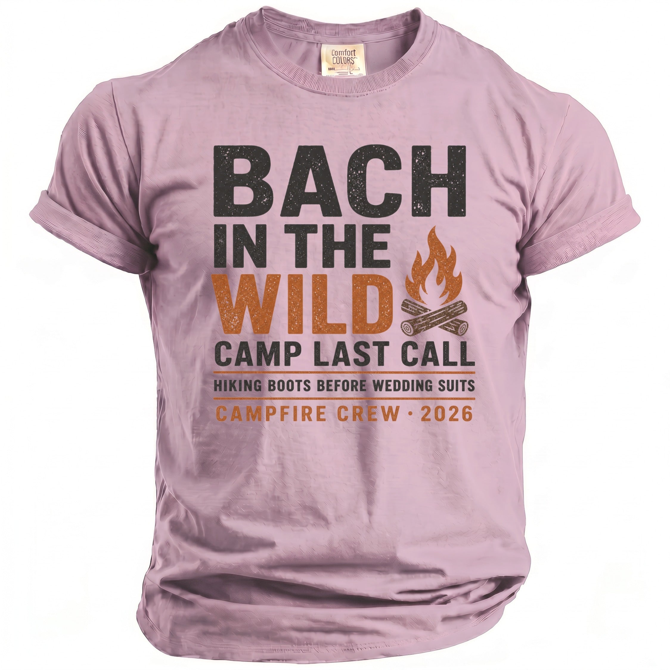 Pink t-shirt with text "BACH IN THE WILD CAMP LAST CALL CAMPFIRE CREW 2026".
