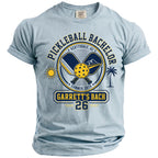 Light blue t-shirt with "Pickleball Bachelor Scottsdale, AZ Summer 2026 Garrett's Bach 26" design.