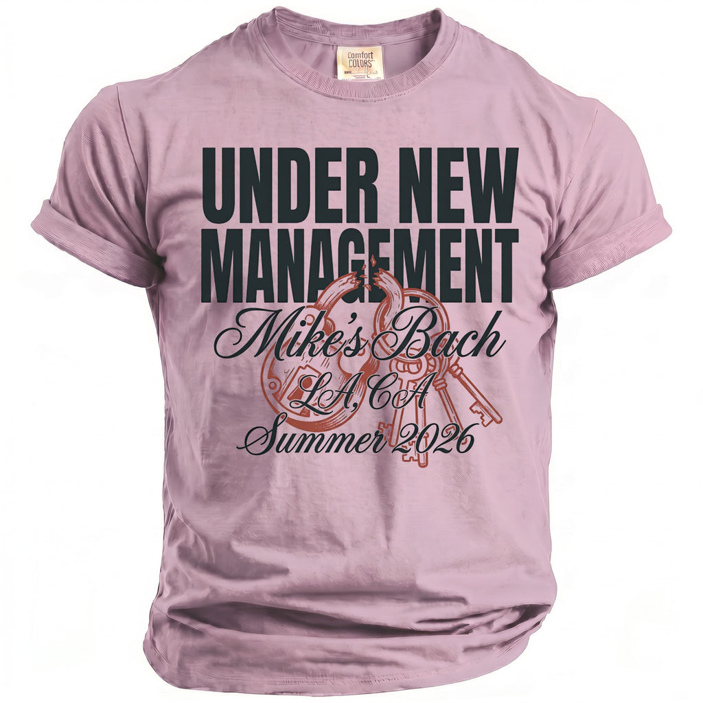 Pink t-shirt with "UNDER NEW MANAGEMENT Mike's Bach L.A. CA Summer 2026" text.