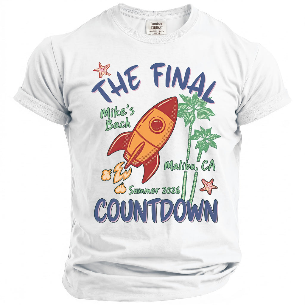 White t-shirt with rocket, palm trees, starfish, and "The Final Countdown" text.