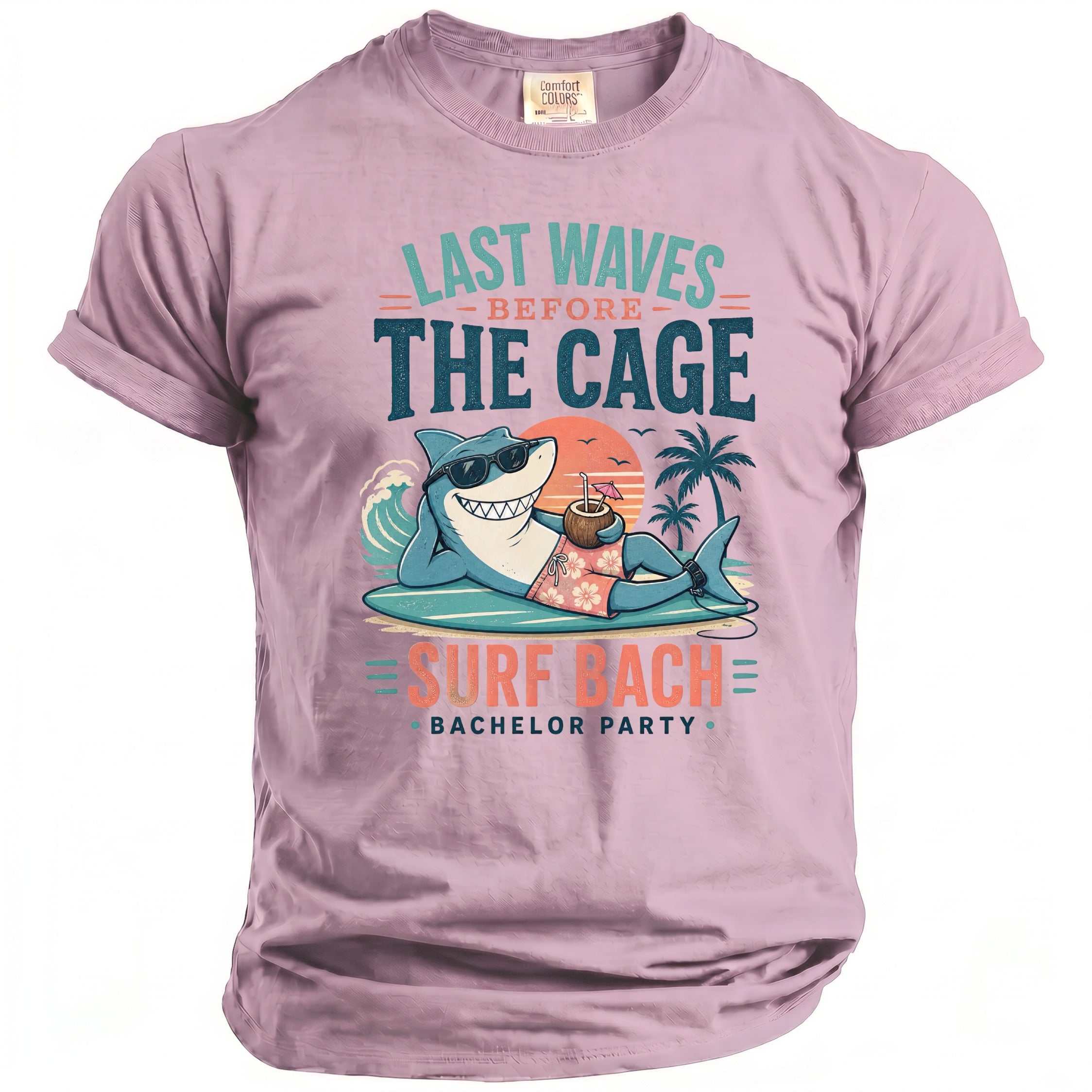 T-shirt graphic: shark in sunglasses on surfboard, "Last Waves Before The Cage", "Surf Bach Bachelor Party".
