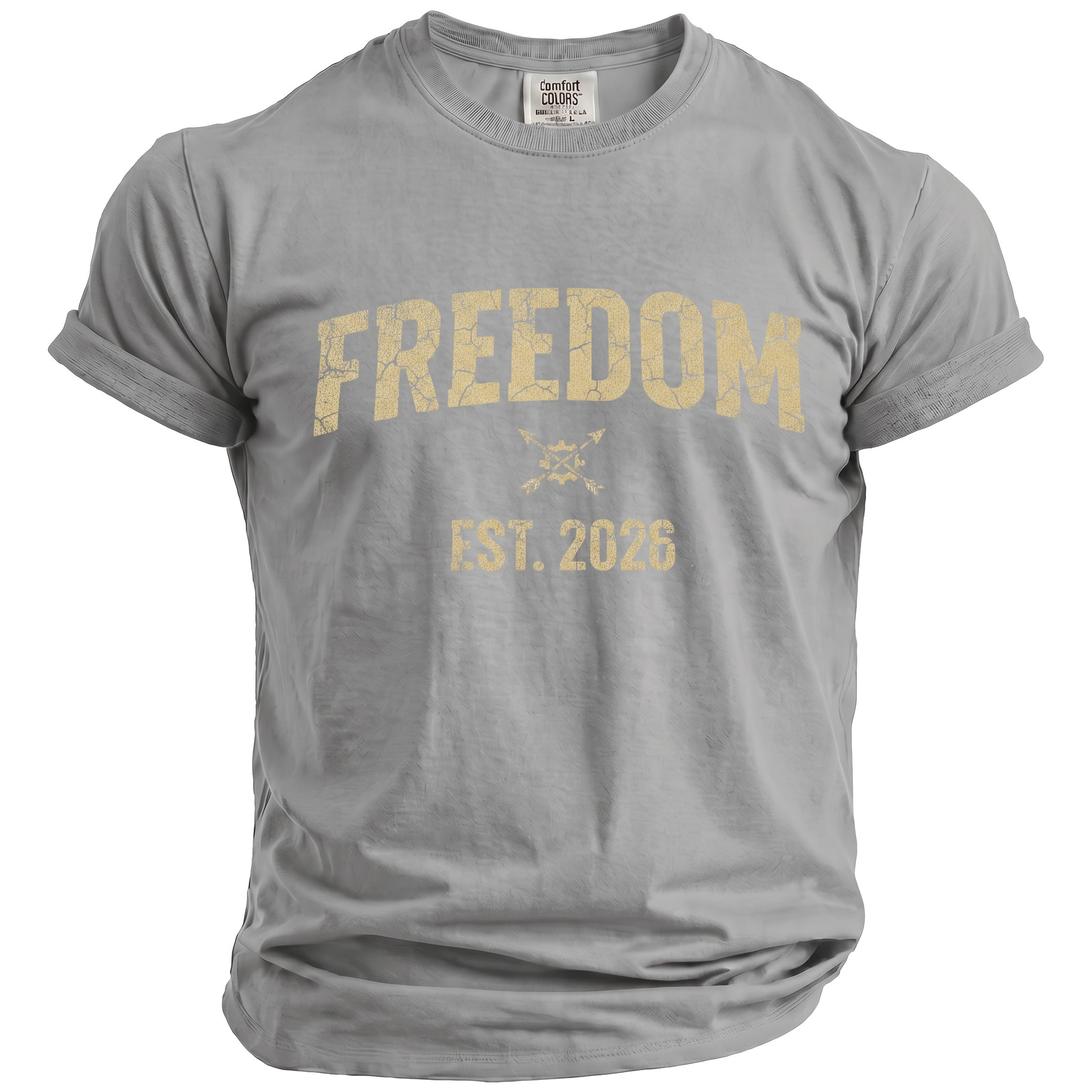 Grey t-shirt with gold cracked text "FREEDOM EST. 2026" and crossed arrows.