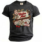 Black t-shirt featuring "Under New Management" with caricatures, cards, keys, and text.