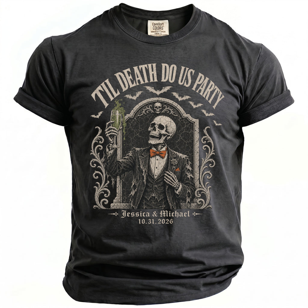 Dark t-shirt with a skeleton in a tuxedo holding a drink, "Til Death Do Us Party" and "Jessica & Michael 10.31.2026".
