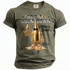 Olive green t-shirt with gold bottle graphic, "The Final Countdown, Mike's Bach," and location/date.