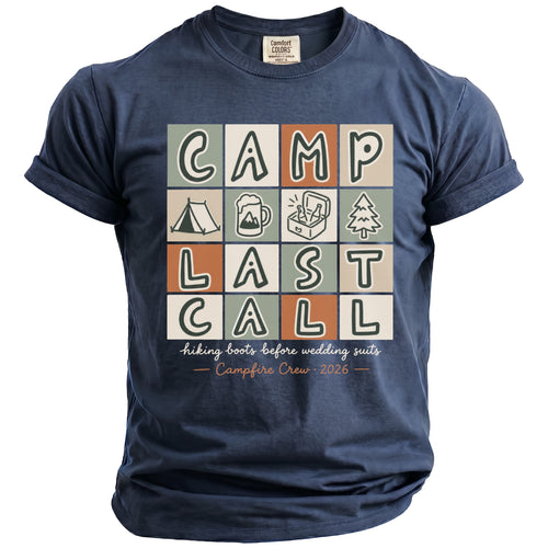 Navy t-shirt with "CAMP LAST CALL" and camping graphics, text reads "hiking boots before wedding suits - Campfire Crew 2026".