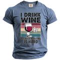 Blue t-shirt with "I DRINK WINE BECAUSE ADULTING IS HARD" text and wine glass graphic.
