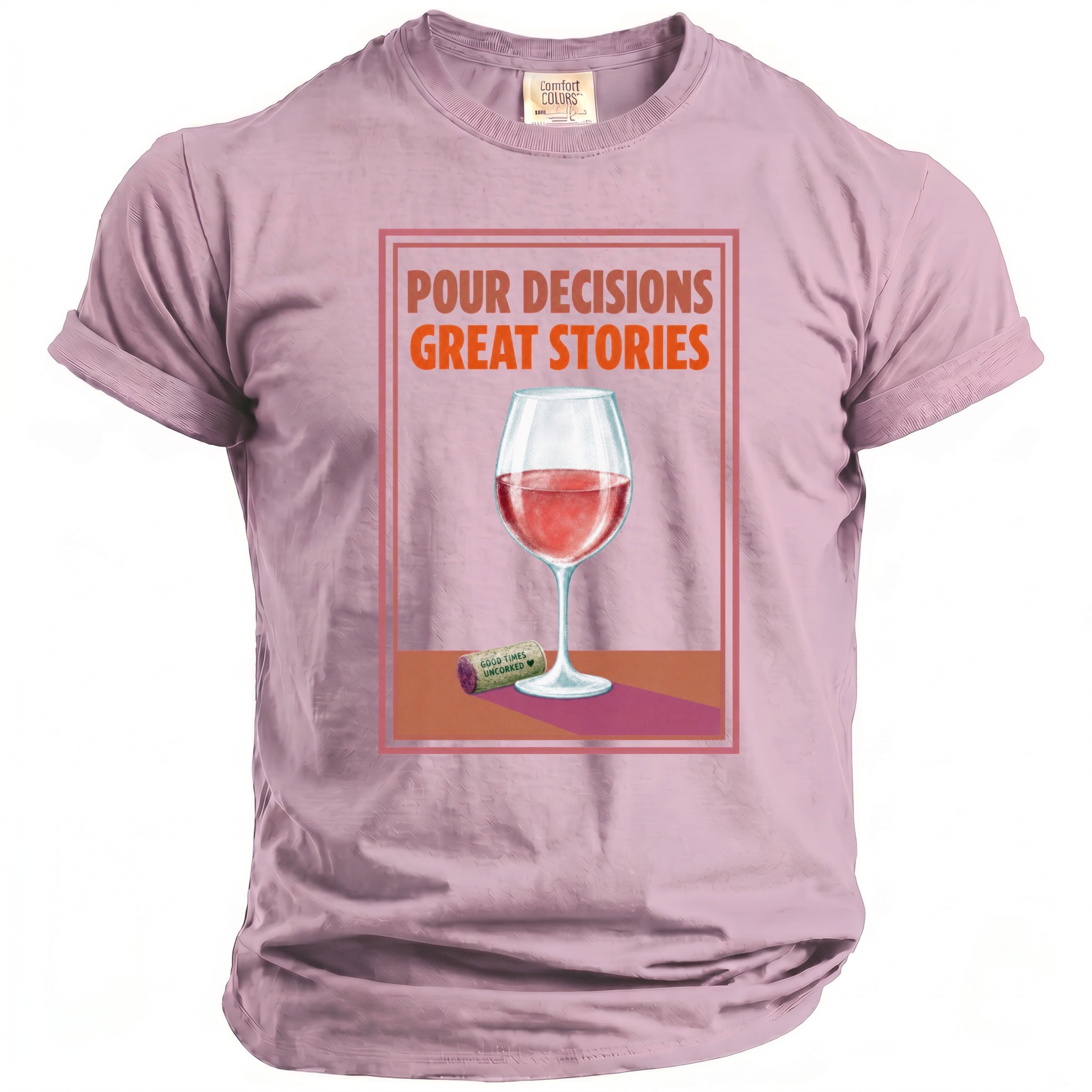 Pink t-shirt with a wine glass and cork graphic. Text reads "POUR DECISIONS GREAT STORIES".