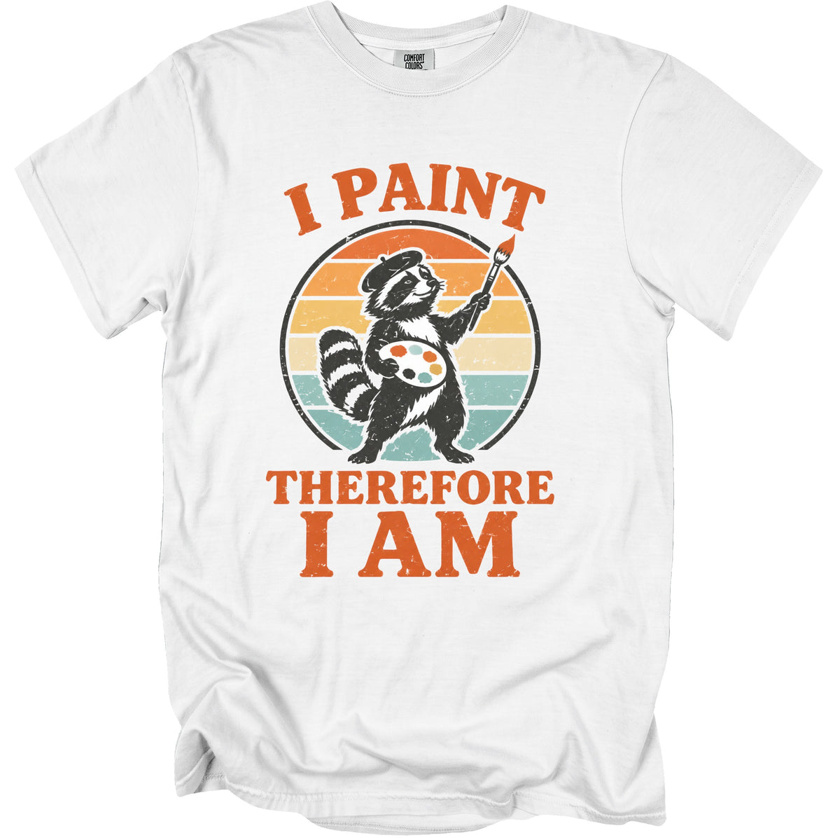 White t-shirt with a vintage graphic of a raccoon artist holding a palette and brush, text "I PAINT THEREFORE I AM".