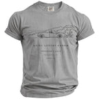Grey t-shirt with line drawing of a classic car, text "QUIET LUXURY GROOM THEODORE'S BACH".