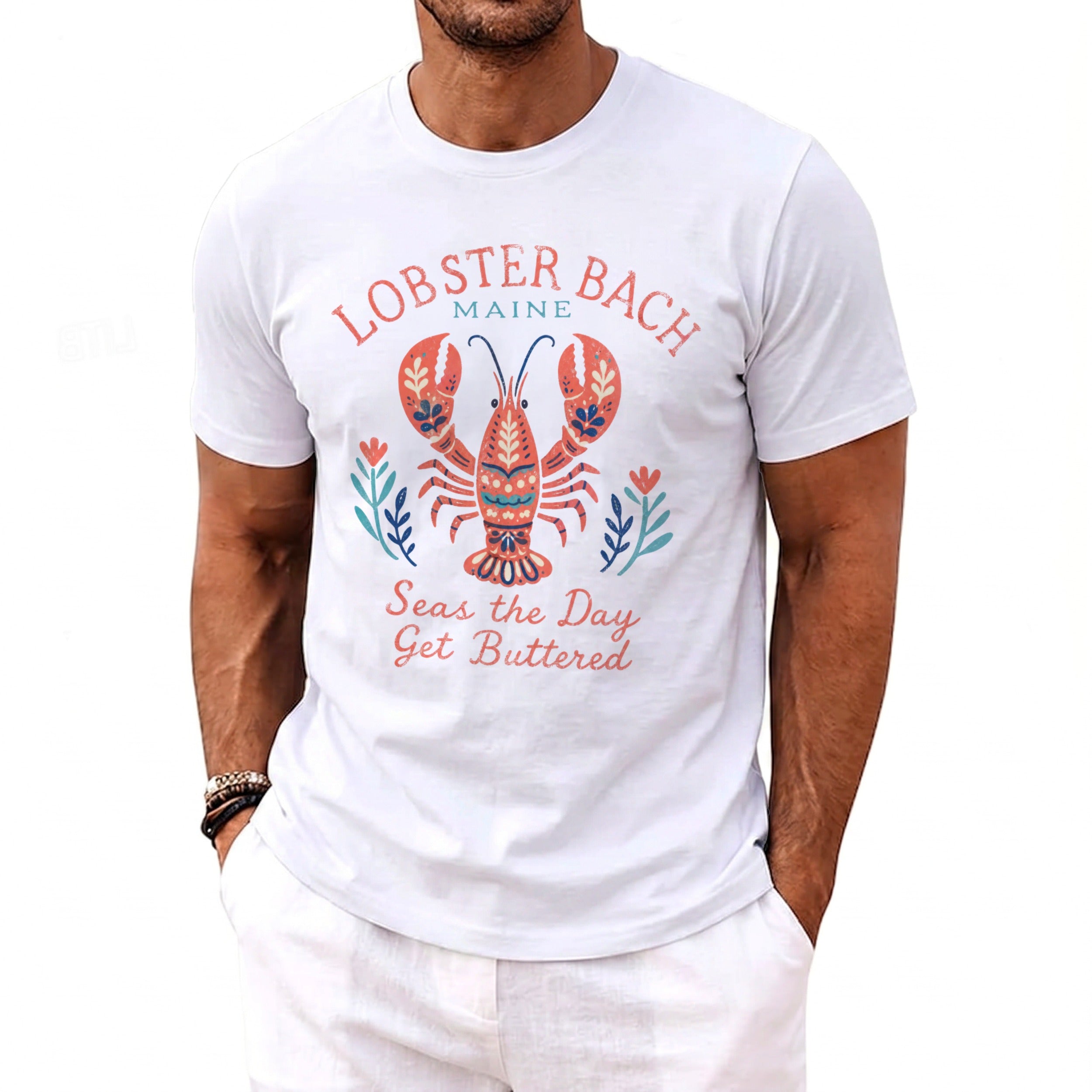 White t-shirt with lobster graphic and text "Lobster Bach Maine Seas the Day Get Buttered".