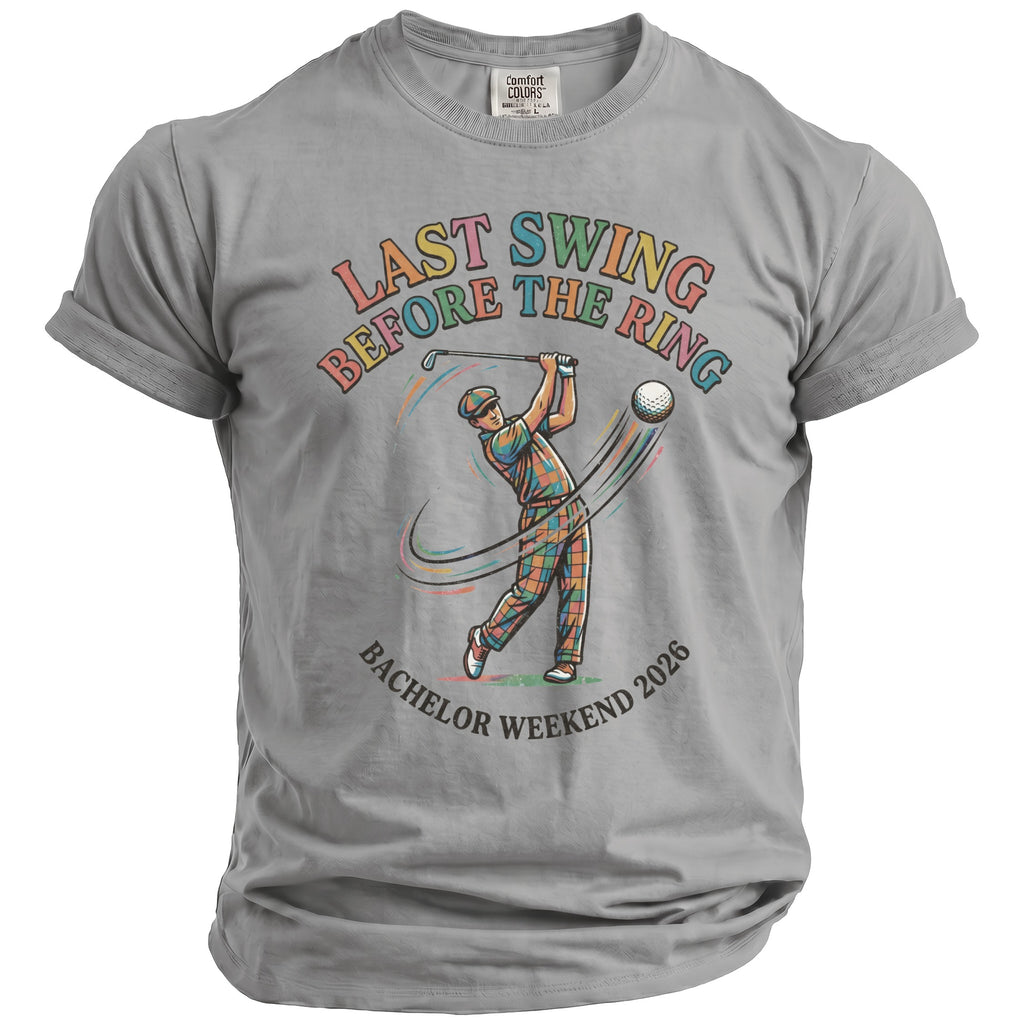 Gray t-shirt with golfer image and text "Last Swing Before the Ring Bachelor Weekend 2026".