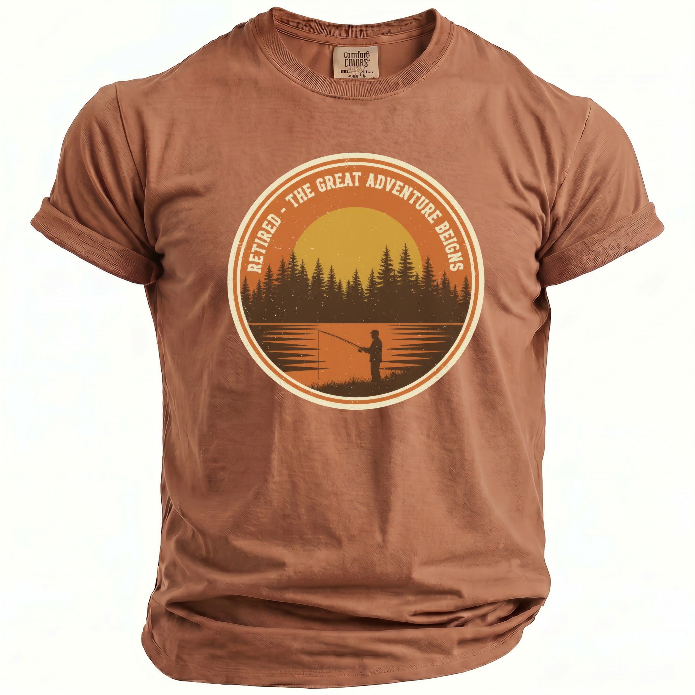 Brown t-shirt with "Retired - The Great Adventure Reigns" graphic of a fisherman at sunset.