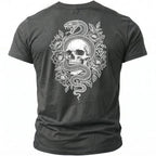 Dark grey t-shirt with a white graphic of a skull wrapped by a snake and flowers.