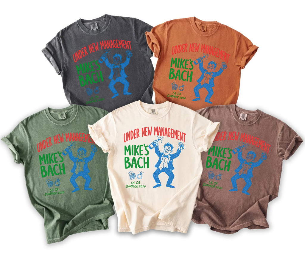 Five t-shirts in different colors feature "Under New Management Mike's Bach" text and graphics.