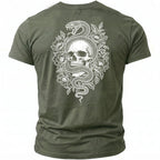 Green t-shirt back with white snake and skull floral graphic.