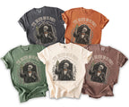 Five t-shirts in different colors with a skeleton groom graphic and text.