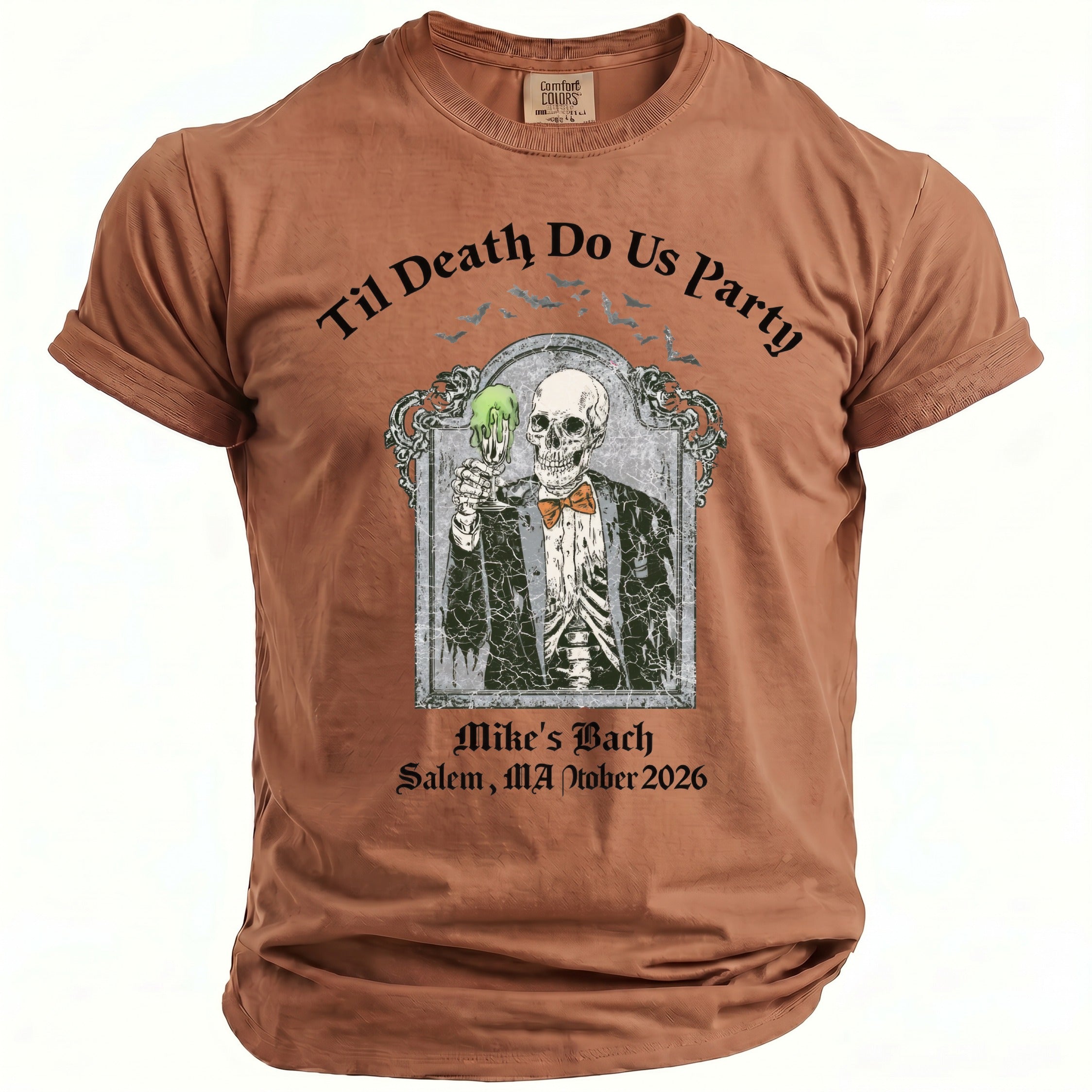 Brown t-shirt with skeleton graphic and text "Til Death Do Us Party" and "Mike's Bach Salem, MA October 2026".