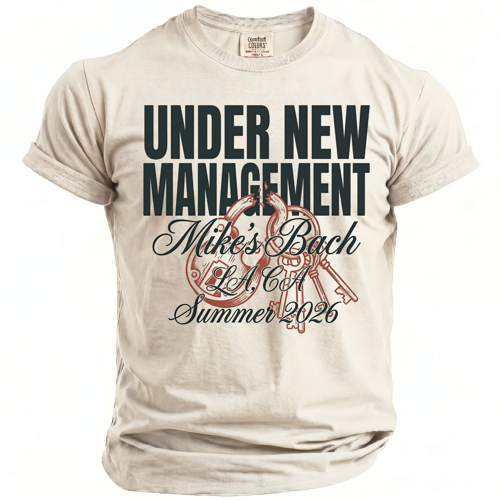 T-shirt with "Under New Management, Mike's Bach, L.A. CA, Summer 2026" text and lock.