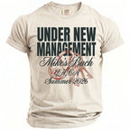 T-shirt with "Under New Management, Mike's Bach, L.A. CA, Summer 2026" text and lock.