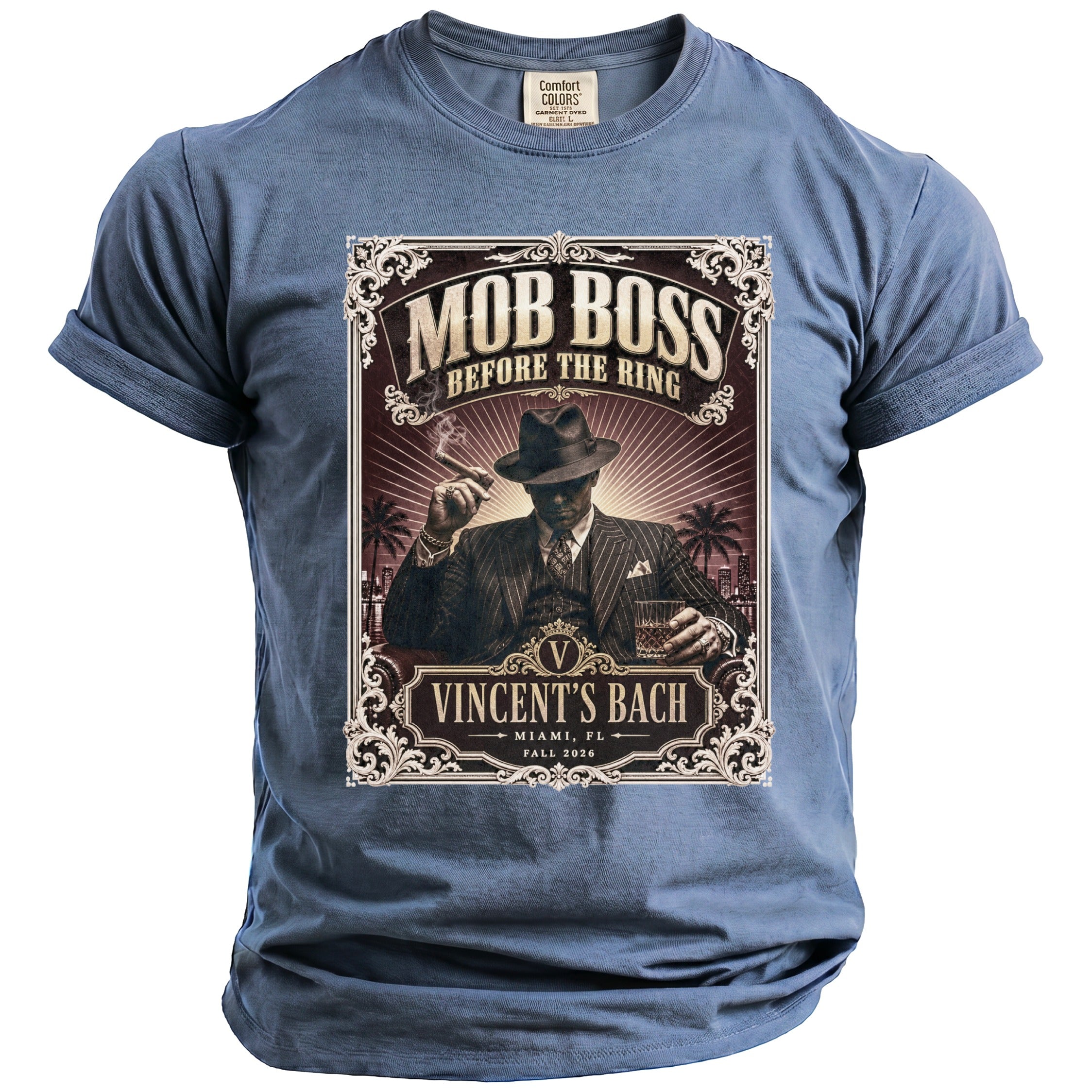 Blue t-shirt featuring "Mob Boss Before the Ring Vincent's Bach Miami, FL Fall 2026" graphic.